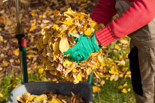 Workers handling household waste