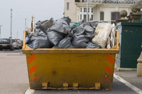 Professional sofa removal team in East London removing furniture